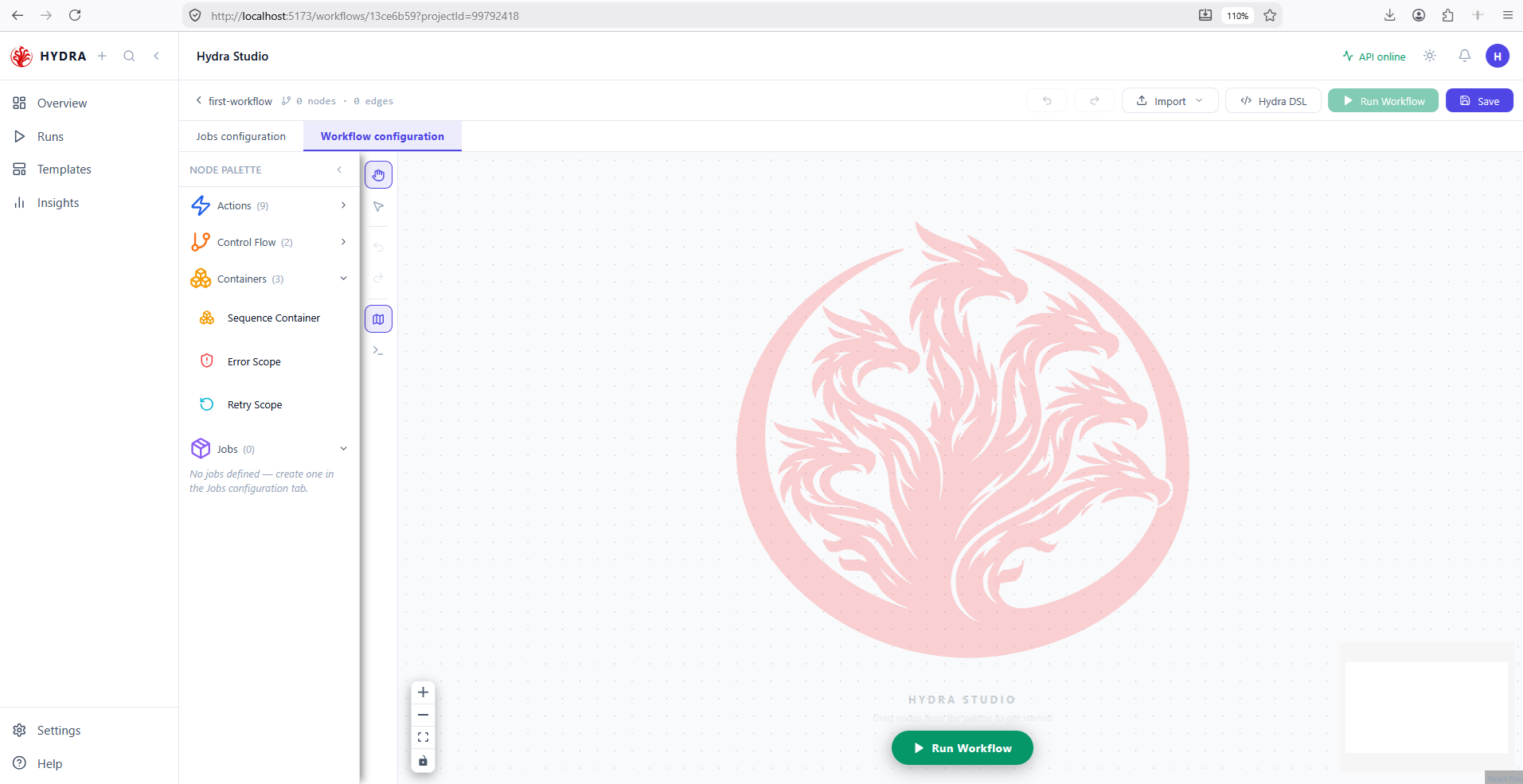 The Hydra Studio editor on an empty canvas for first-workflow, with the node palette on the left listing Actions, Control Flow, Containers and an empty Jobs group.